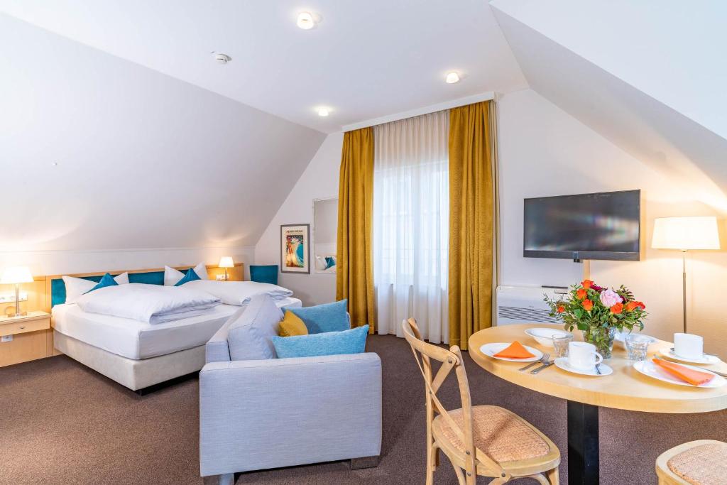 Postel nebo postele na pokoji v ubytování Apartment Hotel Schreier