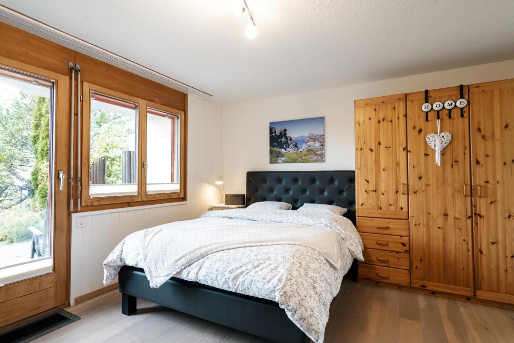 Postel nebo postele na pokoji v ubytování Chalet Ruestel