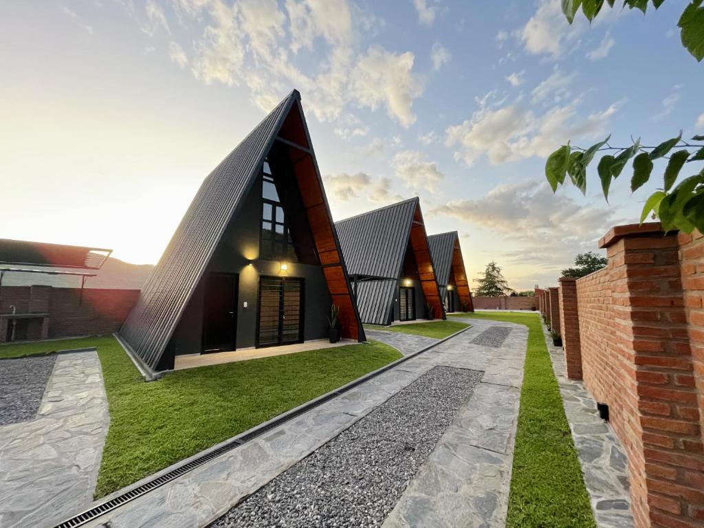 a contemporary house with a black roof at Las MORENAS in Yala