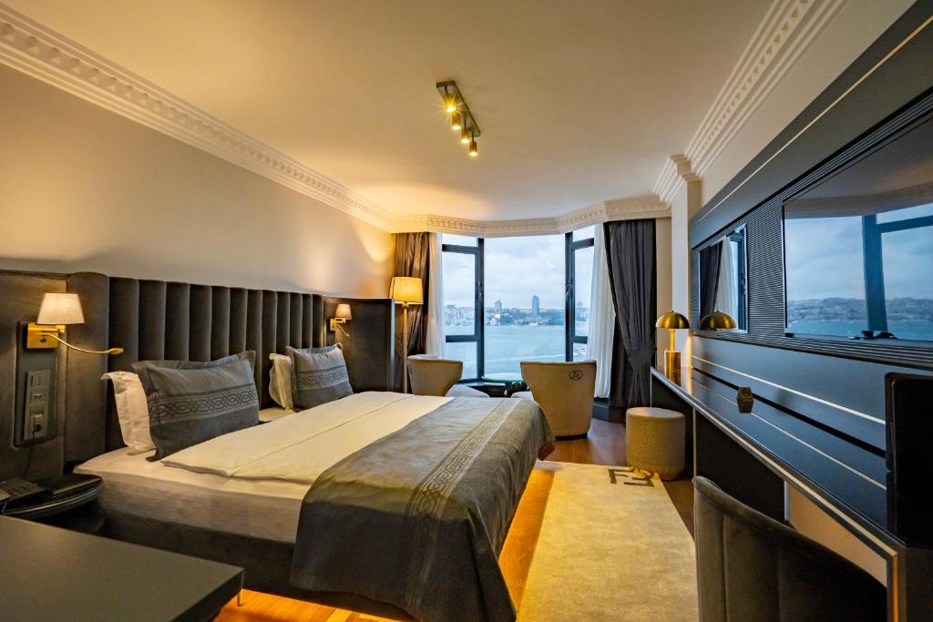 Postel nebo postele na pokoji v ubytování A11 HOTEL BOSPHORUS