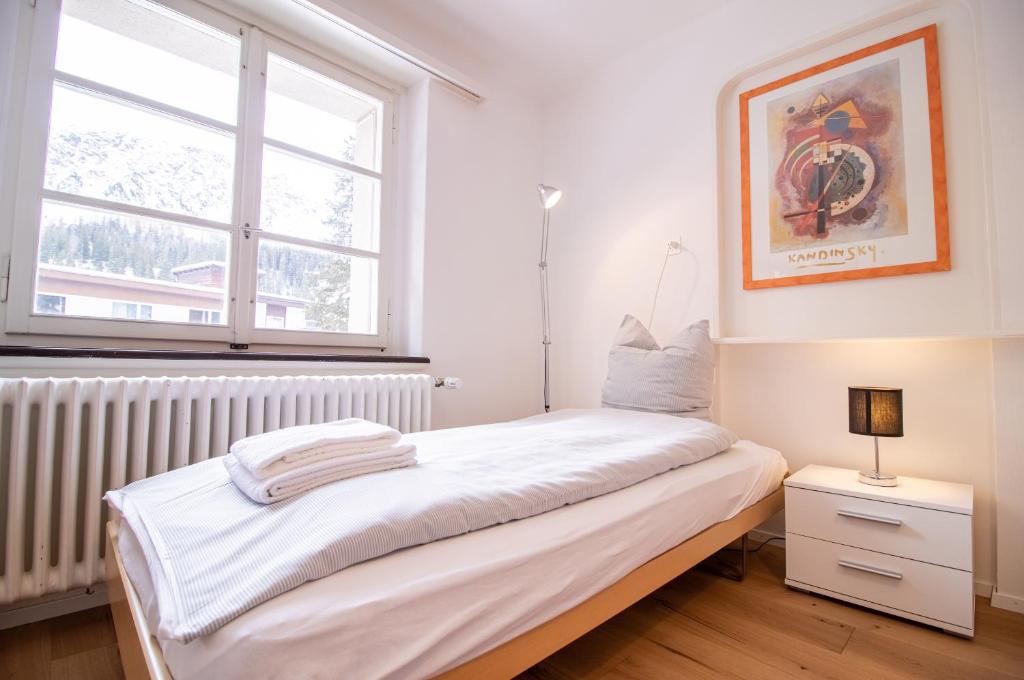 Postel nebo postele na pokoji v ubytování Pradella Garten by Arosa Holiday