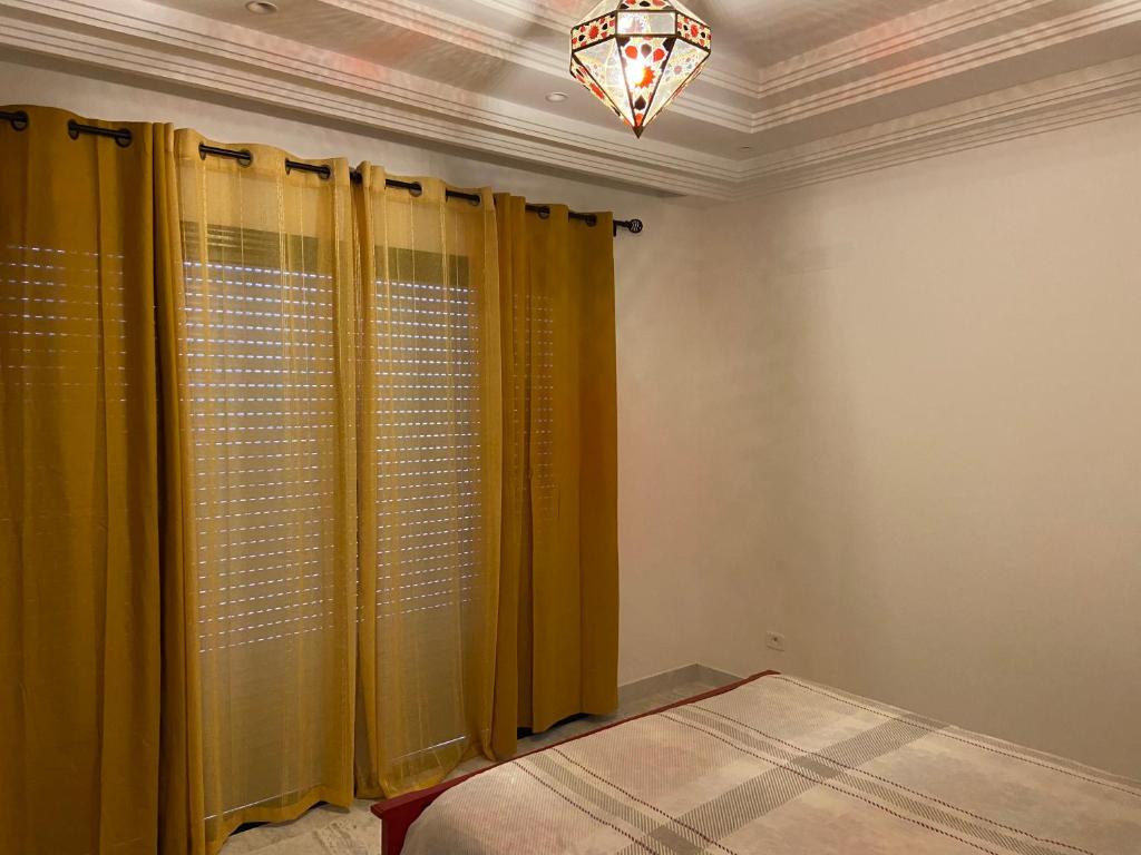 Postel nebo postele na pokoji v ubytování Marsa Authentic Luxury Appart 1