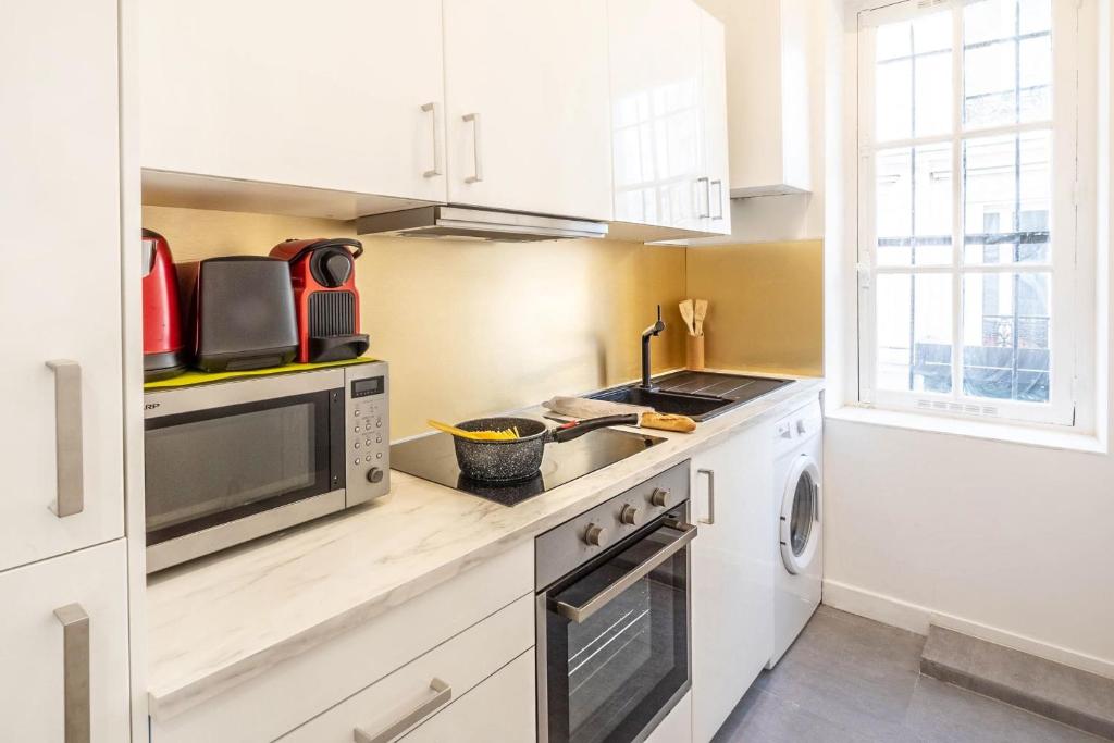 Kuchyňa alebo kuchynka v ubytovaní Modern apartment - 1BR-4P - Parc de Belleville