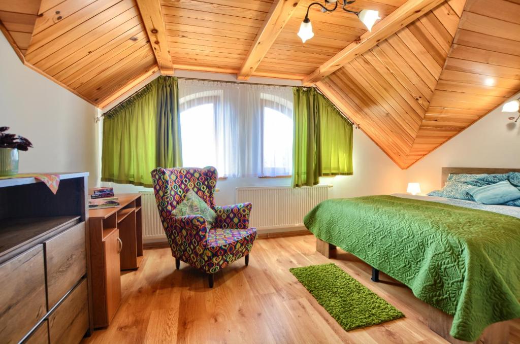 Posteľ alebo postele v izbe v ubytovaní Apartament przy Walowej