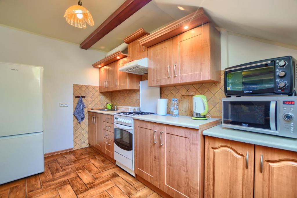 Kuchyňa alebo kuchynka v ubytovaní Apartament przy Walowej