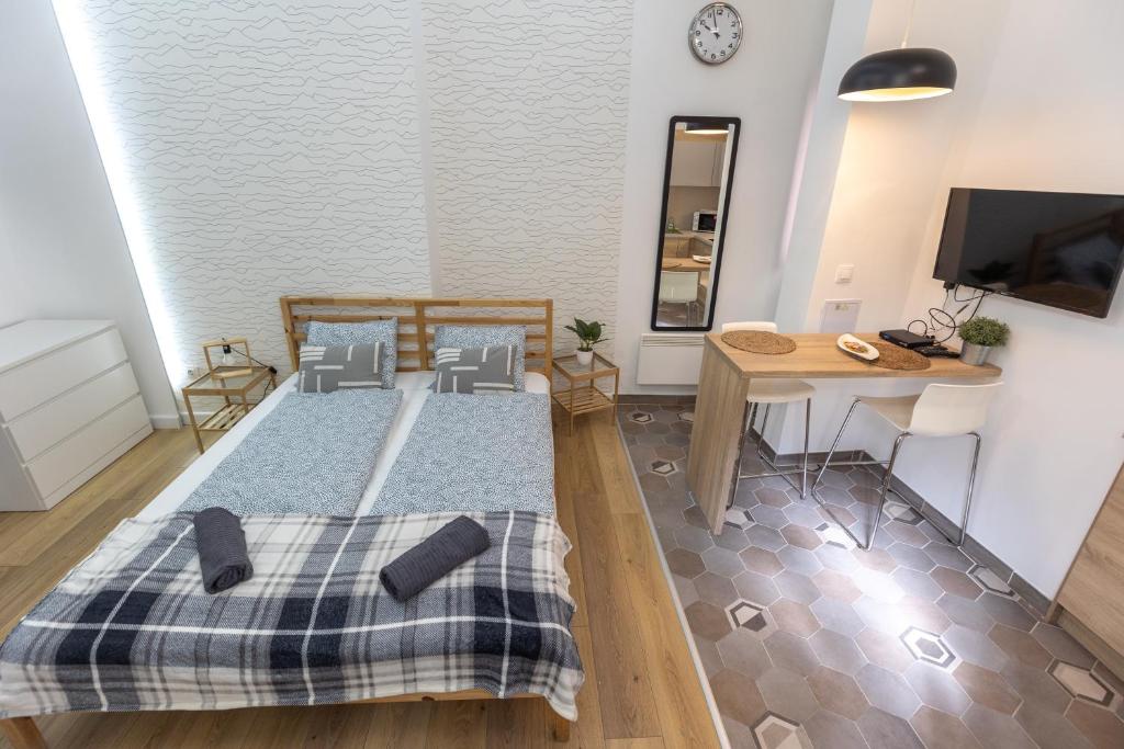 Posteľ alebo postele v izbe v ubytovaní Acacia Apartments