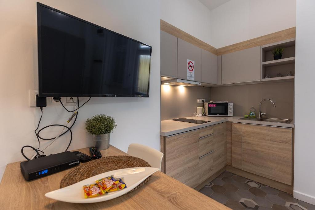 Kuchyňa alebo kuchynka v ubytovaní Acacia Apartments