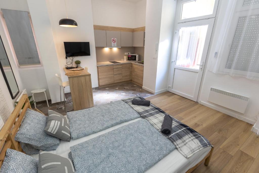 Kuchyňa alebo kuchynka v ubytovaní Acacia Apartments