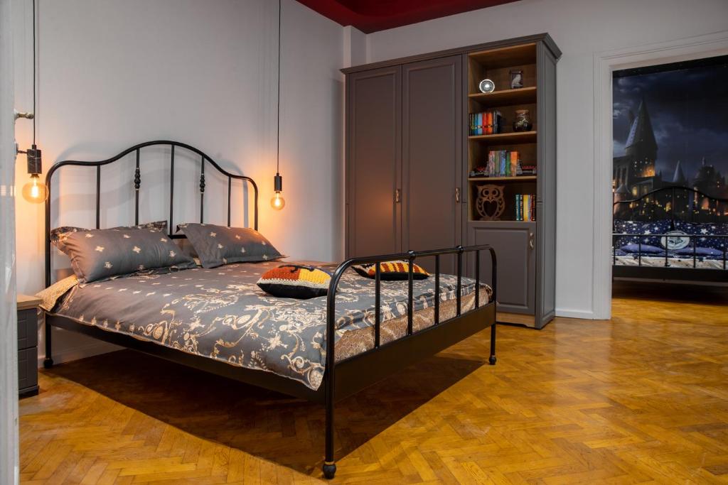 Ένα ή περισσότερα κρεβάτια σε δωμάτιο στο The Leaky Cauldron