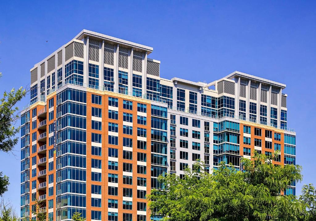 a tall building with a lot of windows at Hala Tysons in McLean