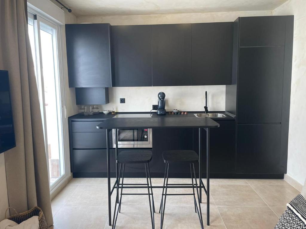 Kuchyň nebo kuchyňský kout v ubytování Edificio Lola 3