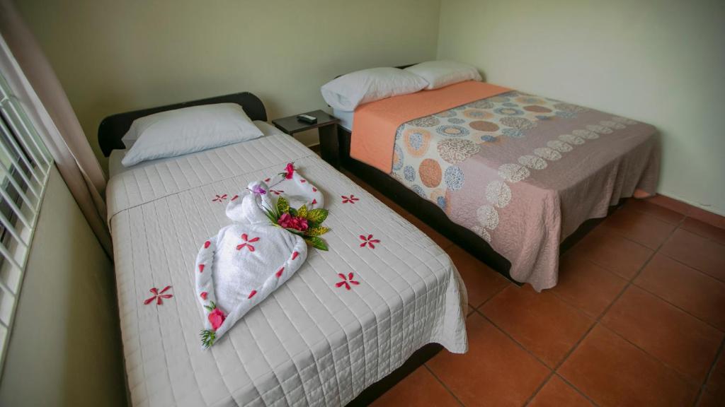 Postel nebo postele na pokoji v ubytování Condo's Vista Al Volcan