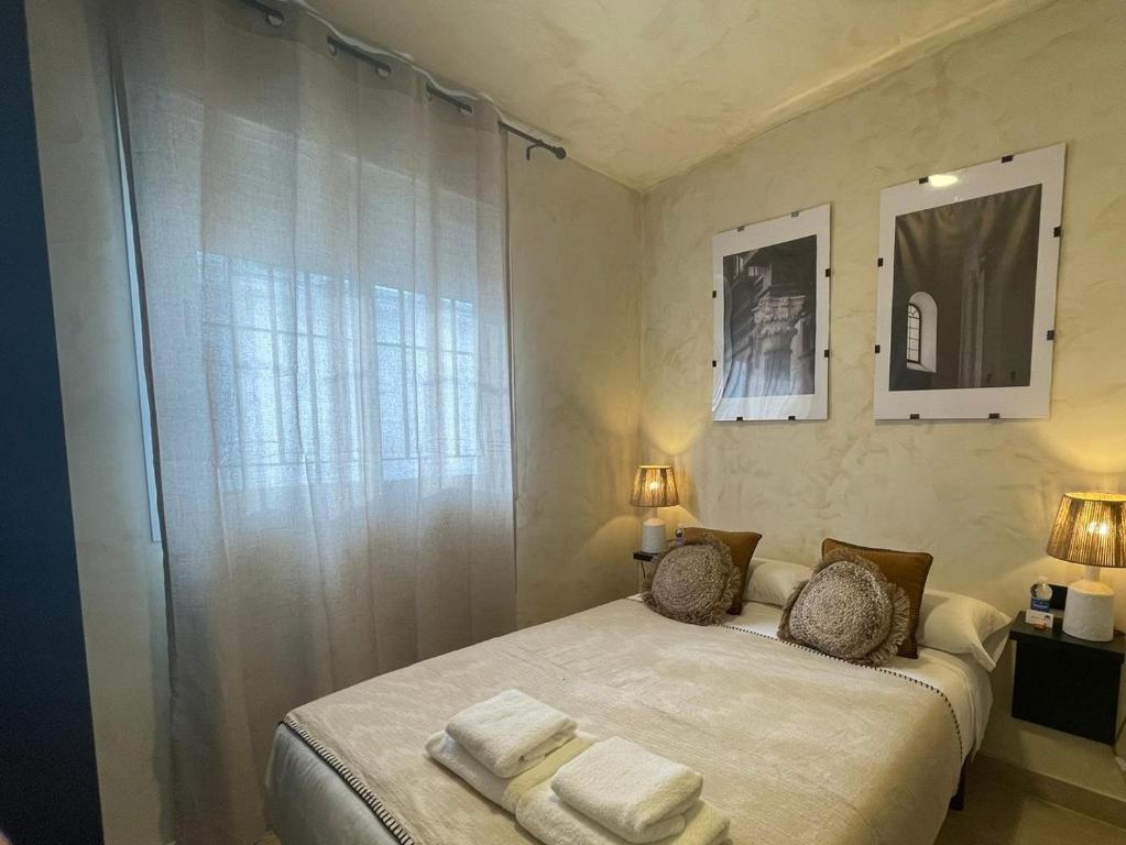 Postel nebo postele na pokoji v ubytování Edificio Lola 3