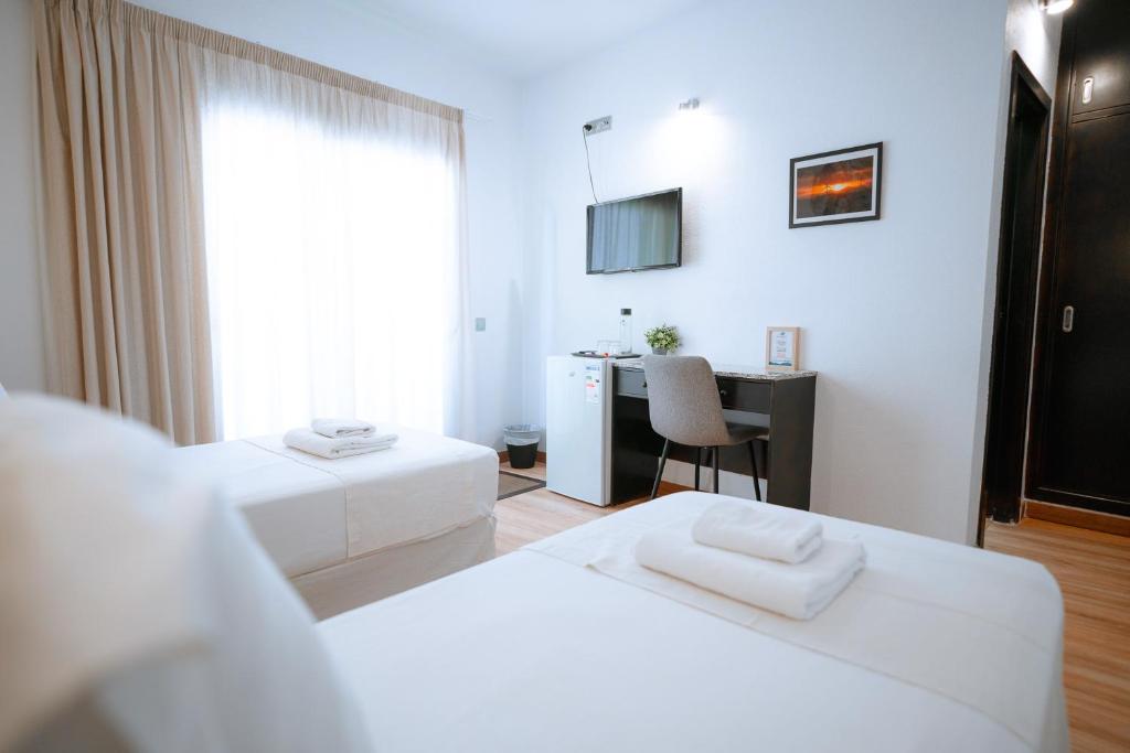 Posteľ alebo postele v izbe v ubytovaní Hotel Ventus