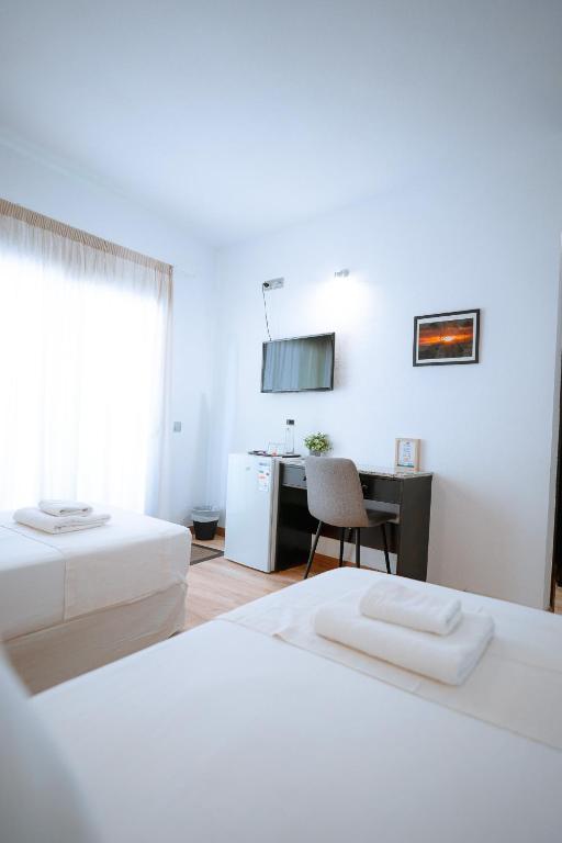 Posteľ alebo postele v izbe v ubytovaní Hotel Ventus