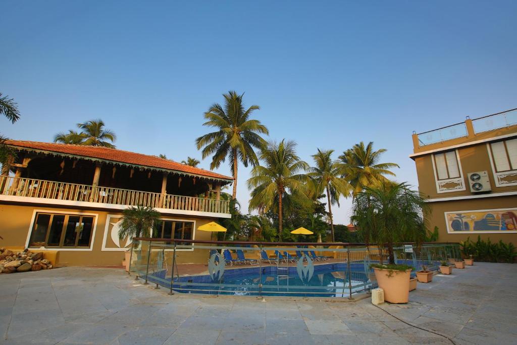 Bazén v ubytování Club Mahindra Acacia Palms nebo v jeho okolí