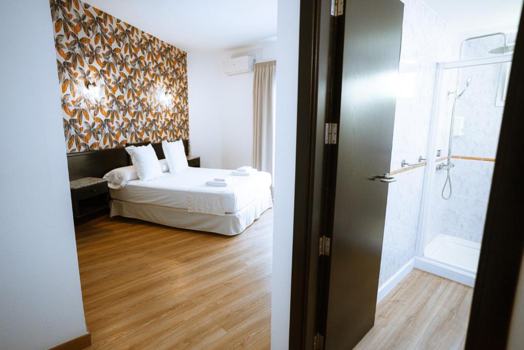 Posteľ alebo postele v izbe v ubytovaní Hotel Ventus
