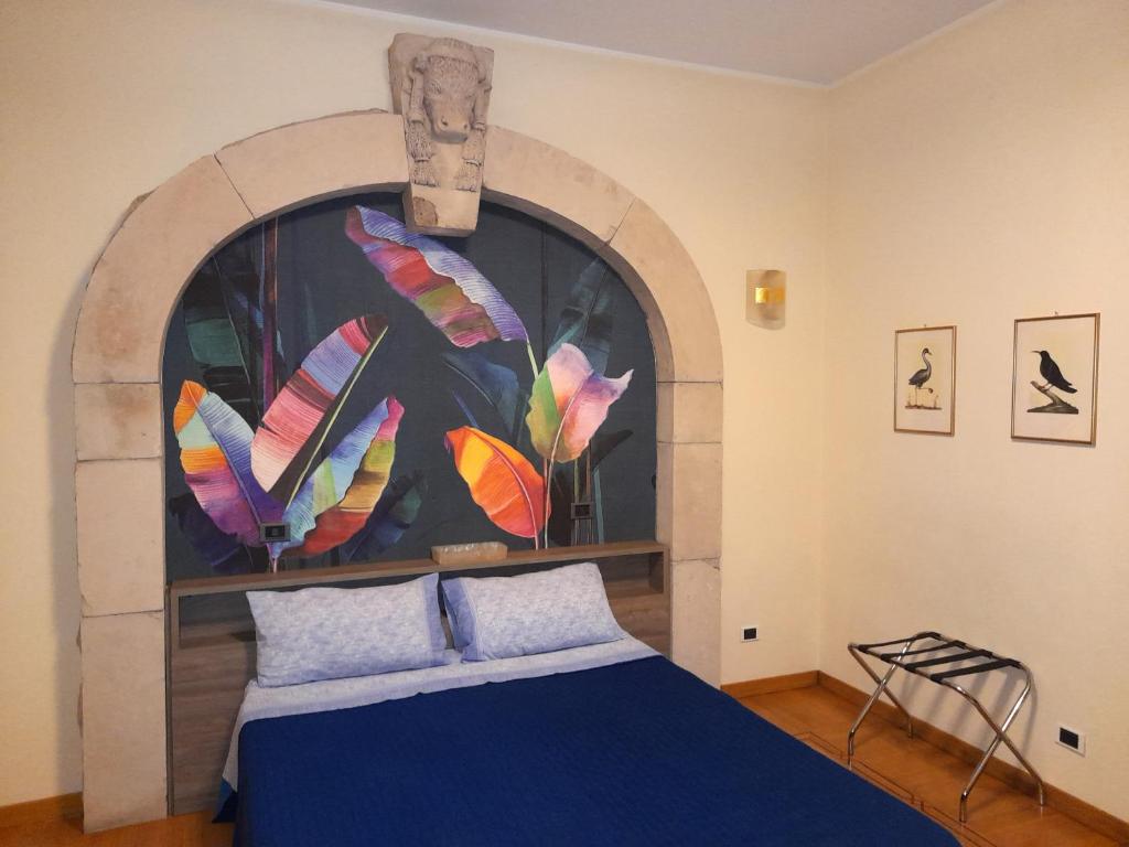 Кровать или кровати в номере Suite Amedei4