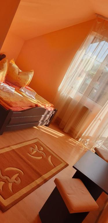 Postel nebo postele na pokoji v ubytování Casa Roland