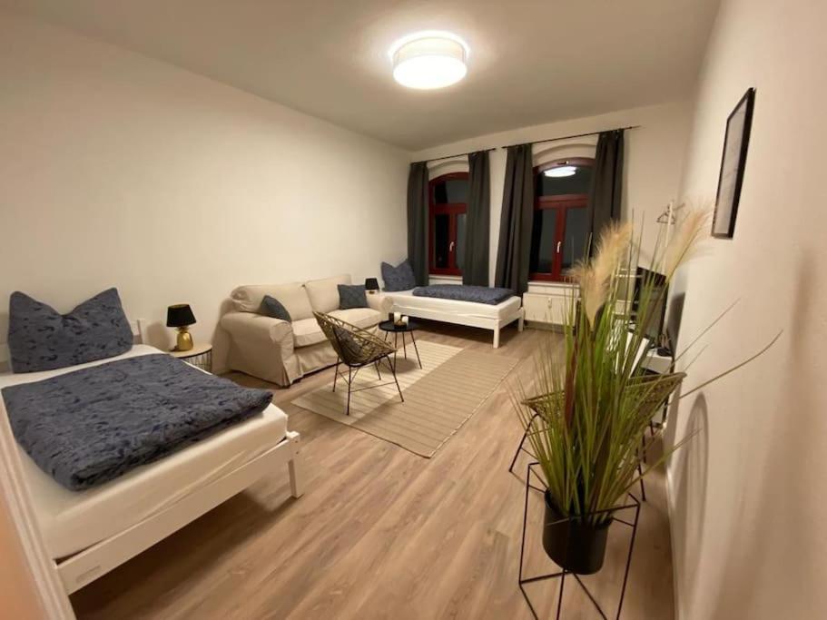 Uma área de estar em modernes cozy Apartment