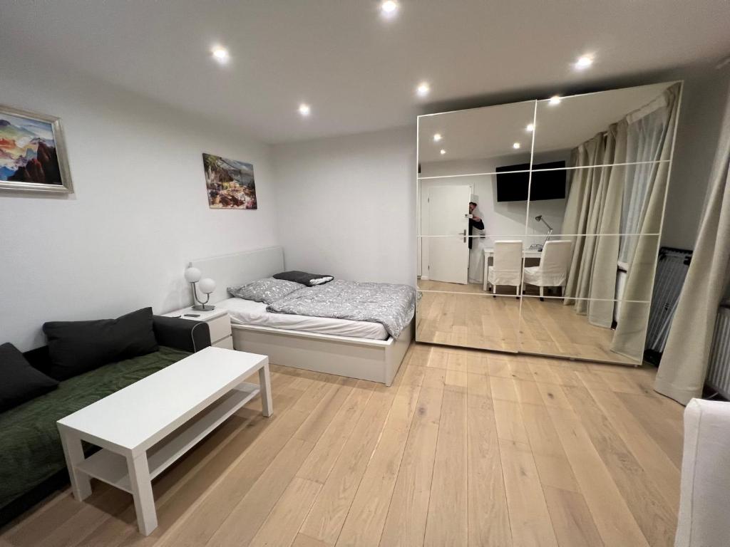 Ένα ή περισσότερα κρεβάτια σε δωμάτιο στο Lovely Apartment close to the Heart of Nürnberg