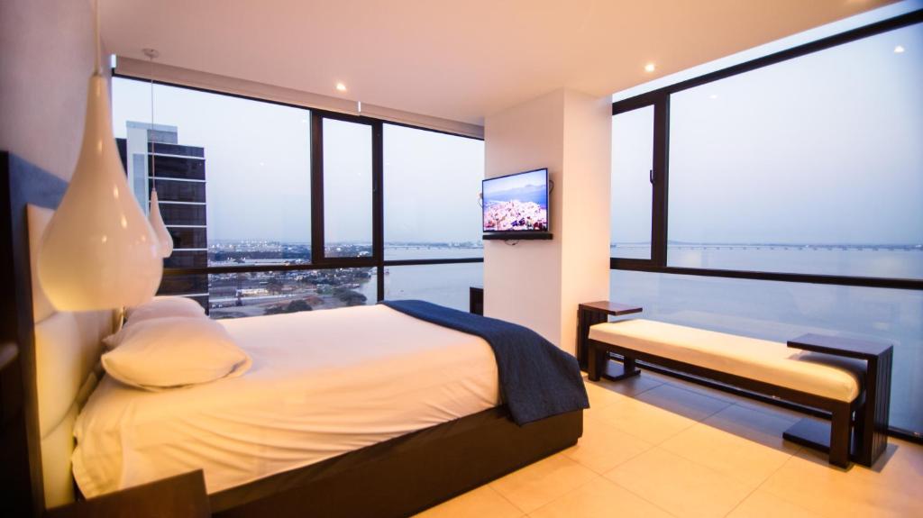 Postel nebo postele na pokoji v ubytování Suite 1403 Bellini 1, Puerto Santa Ana, Guayaquil