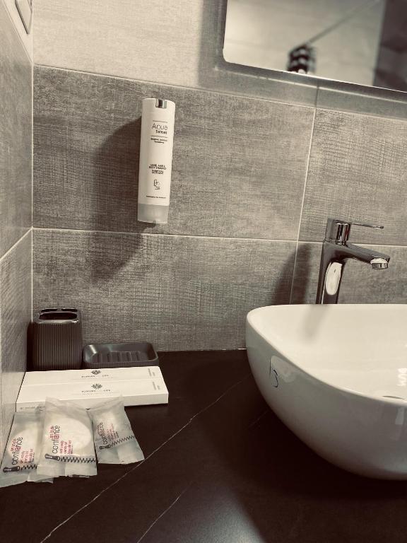 Koupelna v ubytování Hotel Callisto