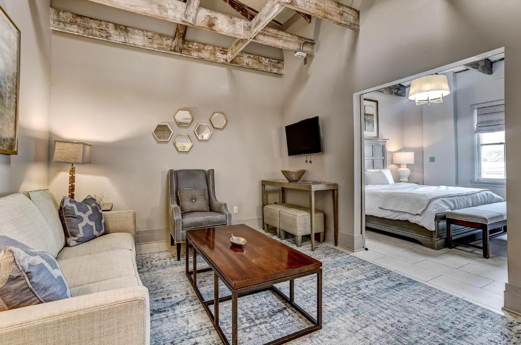 a living room with a couch and a table at Parker's Collection Unit 4 in Savannah