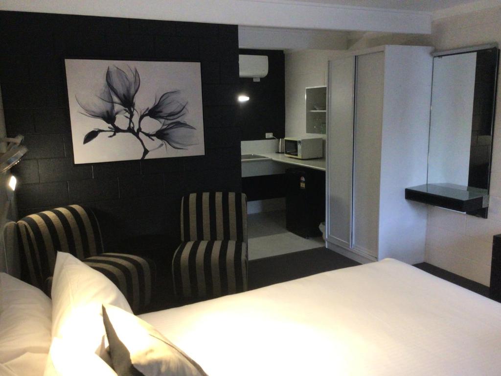 Postel nebo postele na pokoji v ubytování Buderim Fiesta Motel