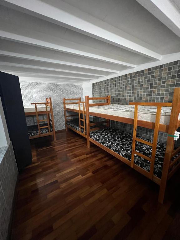 Postel nebo postele na pokoji v ubytování Grande Família Hostel Av paulista