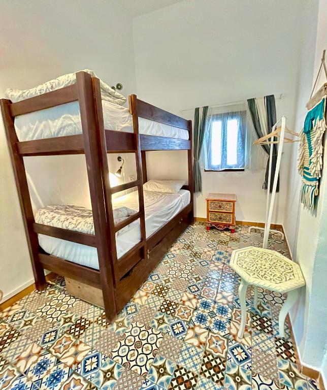 Riad Darna - Cama En La Habitación Del Dormitorio De 4 Camas