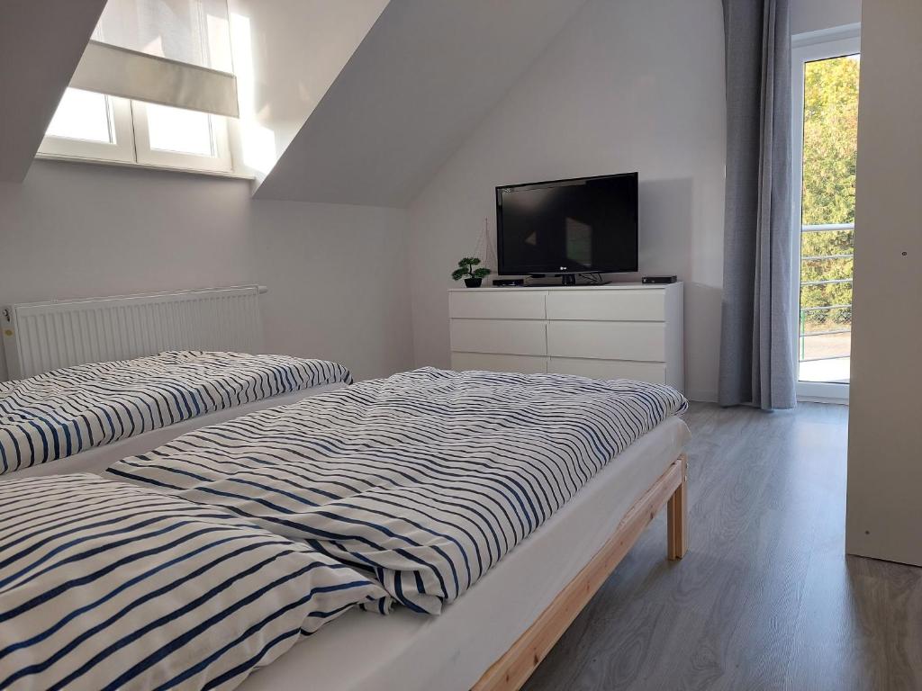Postel nebo postele na pokoji v ubytování Holiday Home Mierki