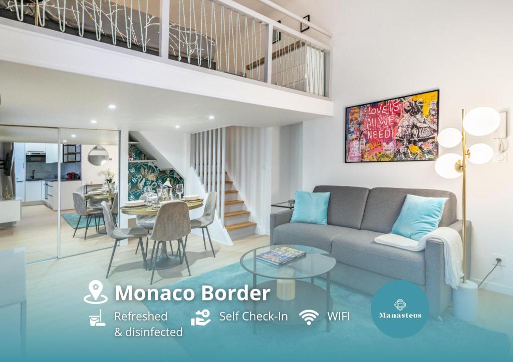 een woonkamer met een bank en een tafel bij Frontière Monaco - Appartement Luxe - Belle Epoque - AL in Beausoleil
