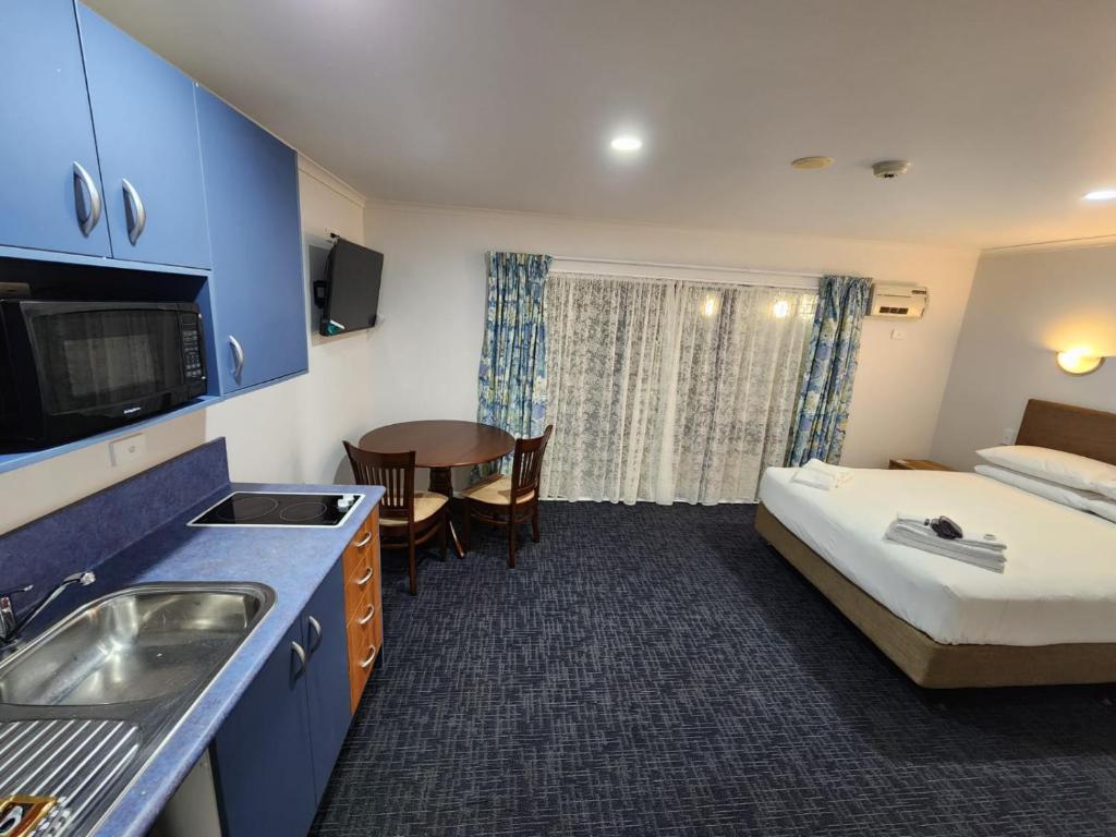 Botany Palms Motel - Resim 9