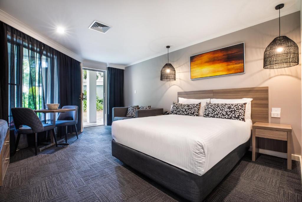 A bed or beds in a room at Doncaster Apartments by Nightcap Plus