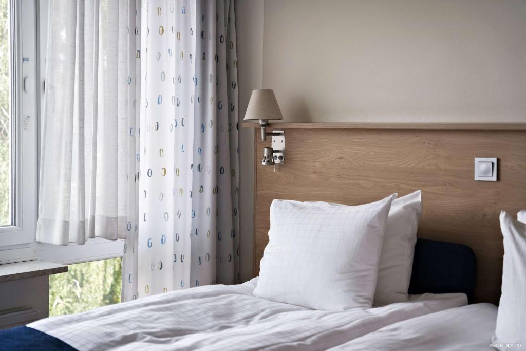 Postel nebo postele na pokoji v ubytování Best Western Hotel Halland