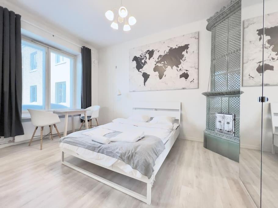 Postel nebo postele na pokoji v ubytování Authentic Central Apartment Helsinki