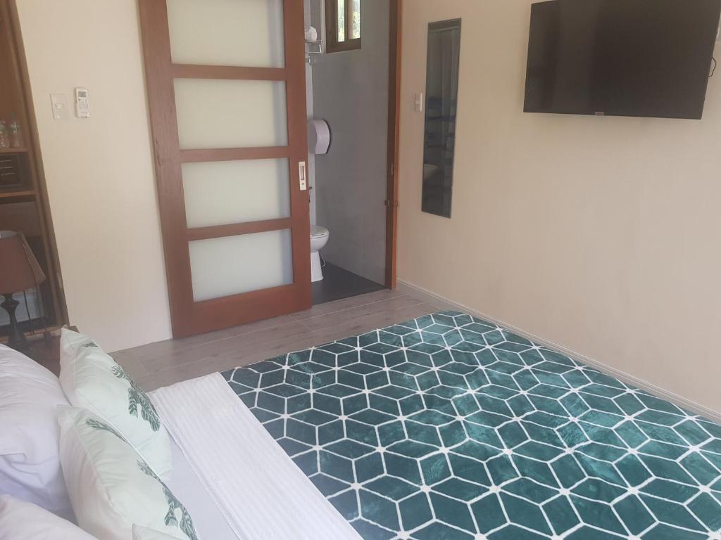 Postel nebo postele na pokoji v ubytování Hayahay Resort