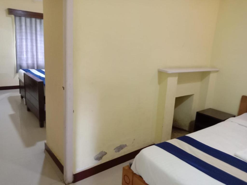 Postel nebo postele na pokoji v ubytování Bruton resorts