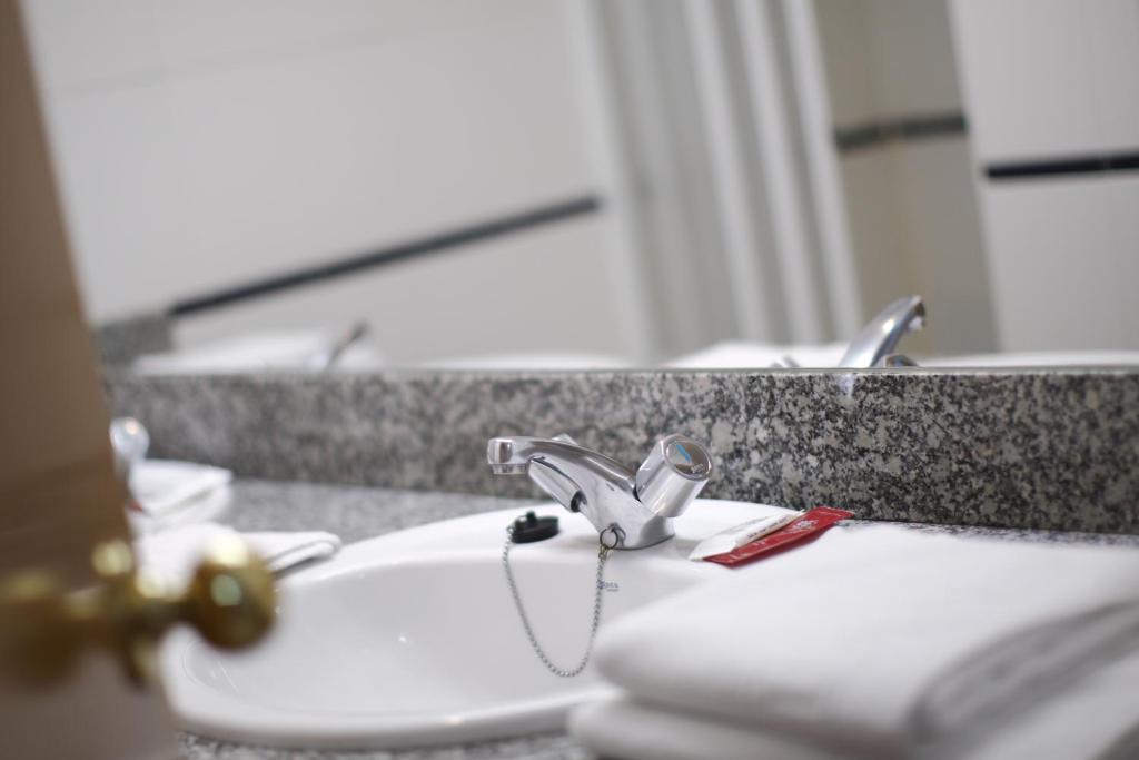 Koupelna v ubytování Hotel Rialta