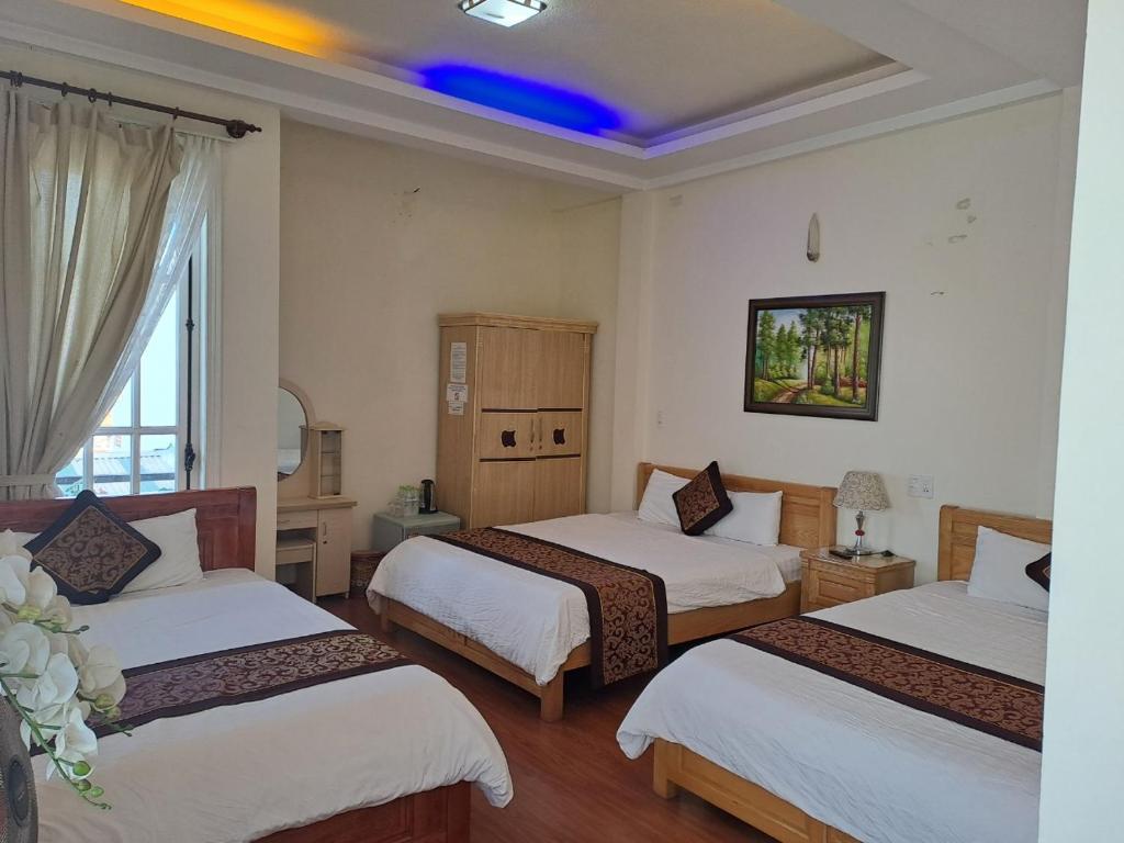 Postel nebo postele na pokoji v ubytování Thien Phu Guesthouse Dalat