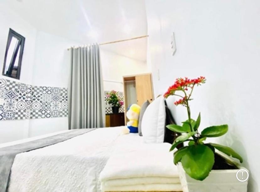 Postel nebo postele na pokoji v ubytování RiverView Homestay 2