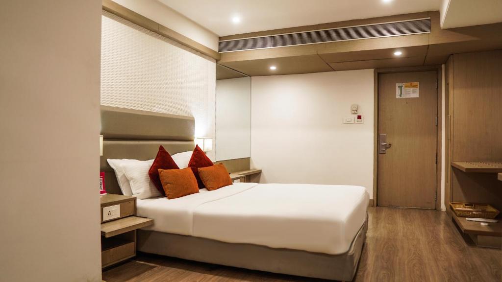 Postel nebo postele na pokoji v ubytování Hotel Centre Point