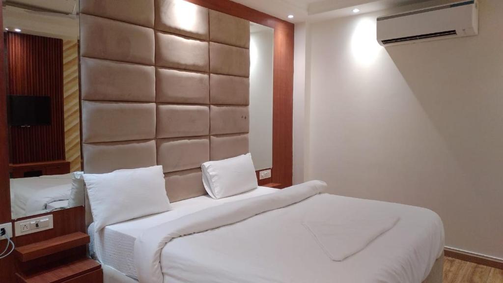 Postel nebo postele na pokoji v ubytování Hotel RIVERB