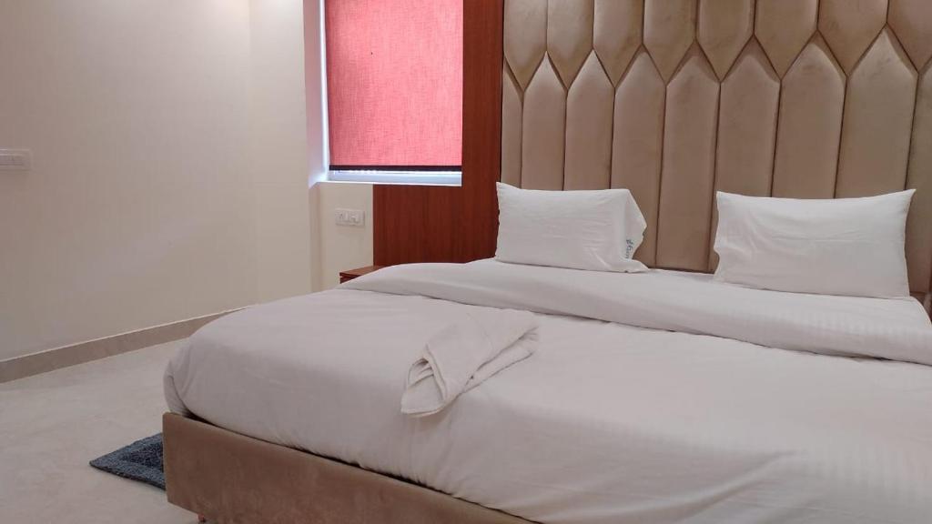 Postel nebo postele na pokoji v ubytování Hotel RIVERB