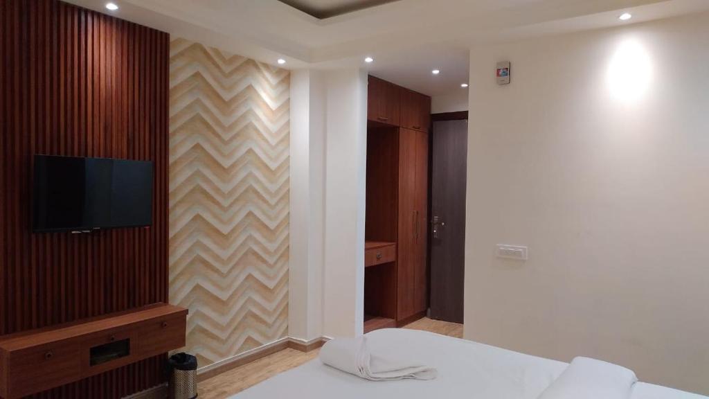 Postel nebo postele na pokoji v ubytování Hotel RIVERB