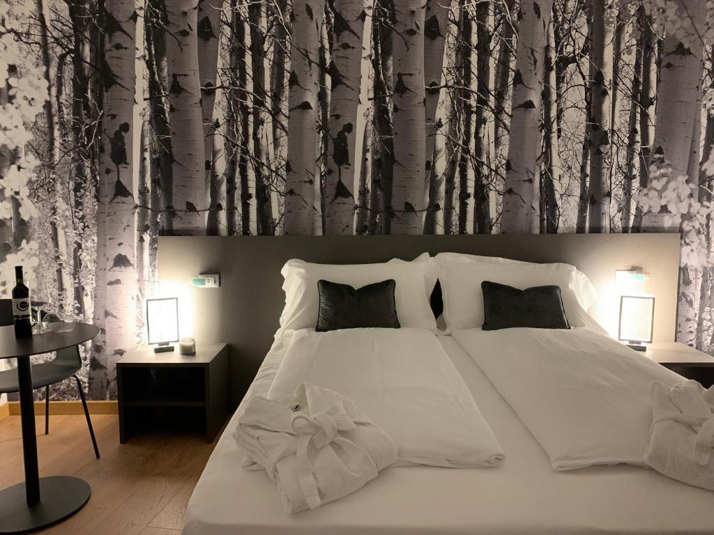 Voodi või voodid majutusasutuse Guest House Le Cassandre toas