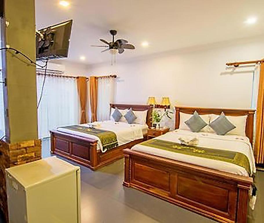 Postel nebo postele na pokoji v ubytování The Five Senses Boutique Hotel
