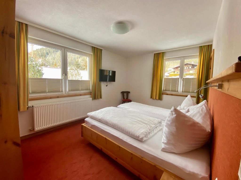 Postel nebo postele na pokoji v ubytování Appartement Hubner