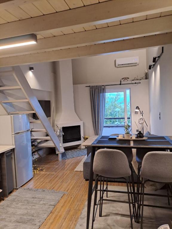 A kitchen or kitchenette at Vrachos Suites